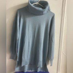 Women’s light blue turtleneck sweater. Size M. Brand new condition- never worn.